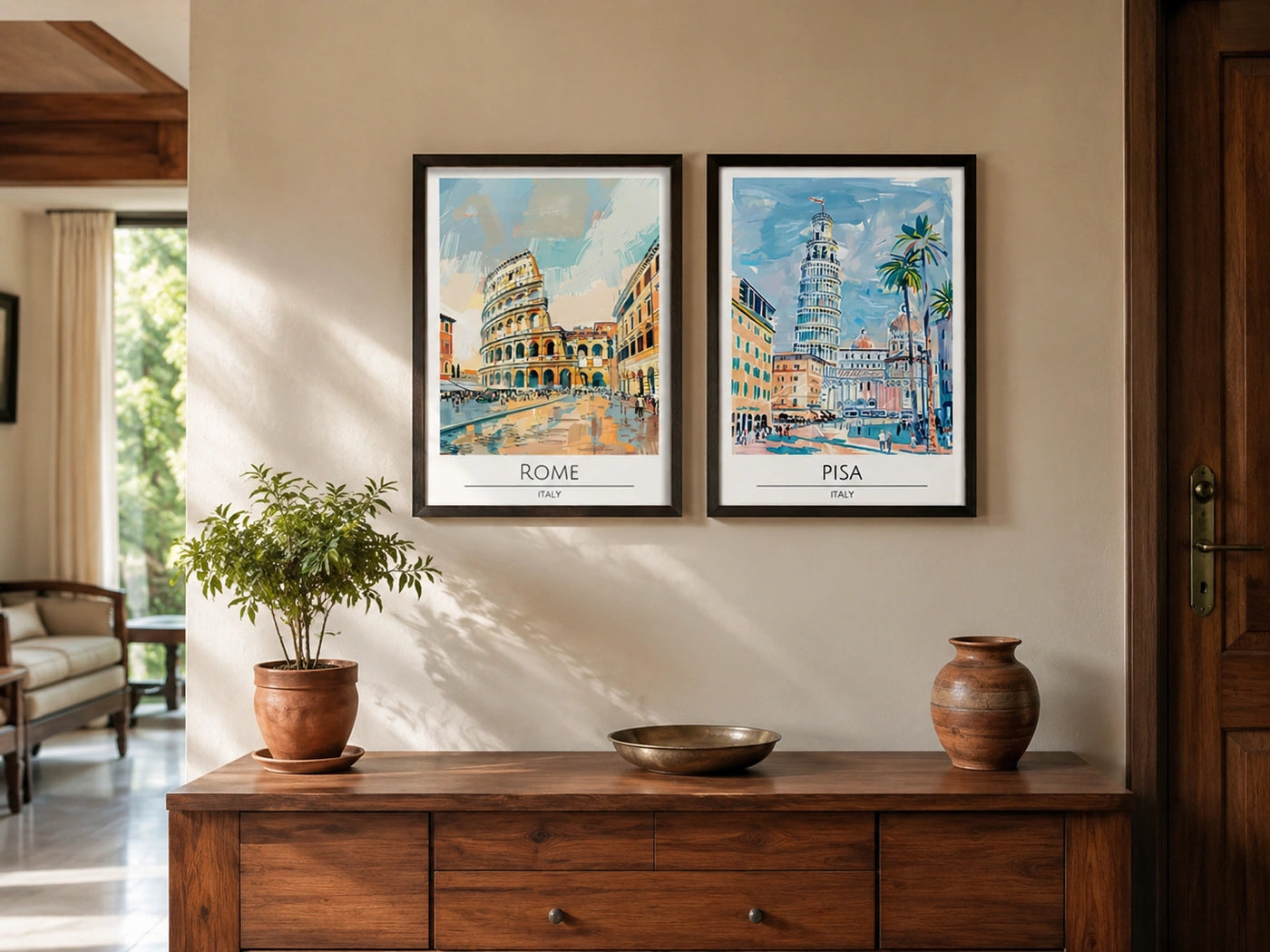Artwork of set of two italian city travel posters above a console in indian home