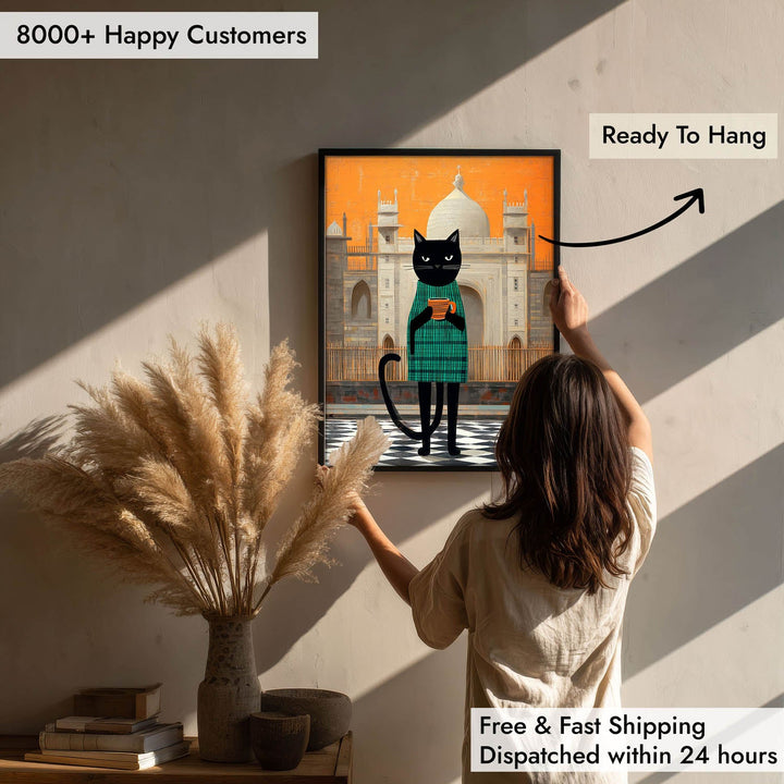 standing cat holding a cup of coffee  