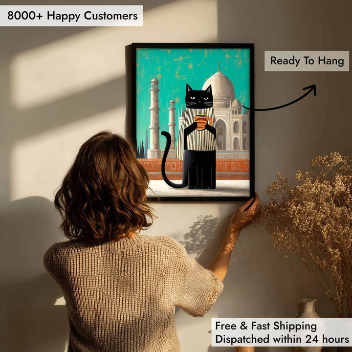 standing cat holding a cup of coffee  