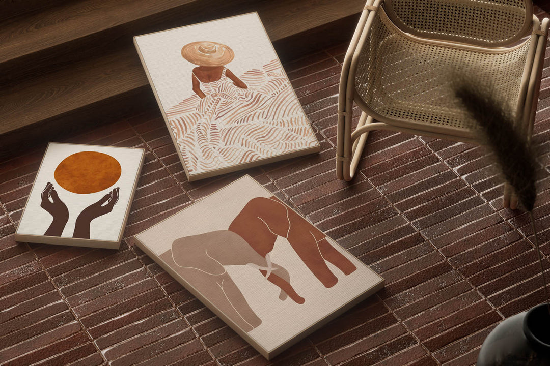 Multiple boho artworks lying on floor of modern indian home 