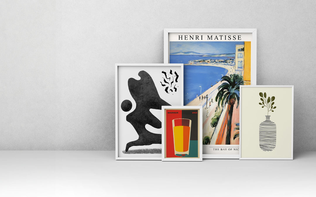 multiple artworks kept against wall